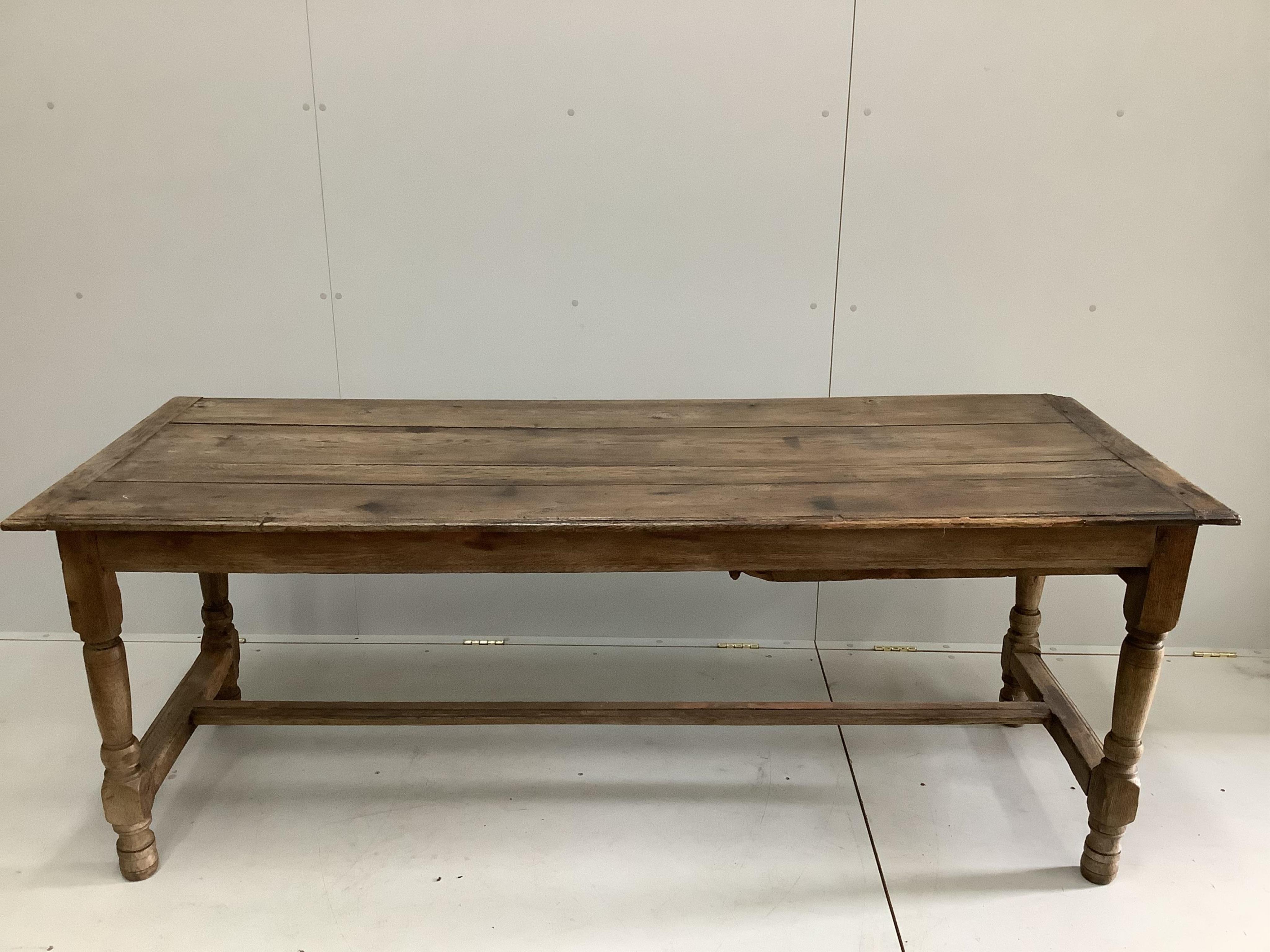 An 18th century French refectory dining table with one drawer, width 195cm, depth 72cm, height 75cm